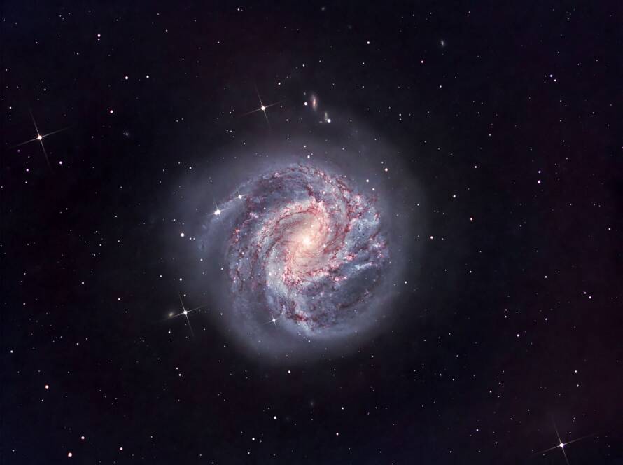 Southern Pinwheel Galaxy — A Spiral of Light and Dust